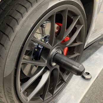 Immaculate Reflections Auto Detailing - Centerlock wheel with Porsche removal guide tool - Auto Detailing Near Me - Brentwood, California Immaculate Reflections Auto Detailing - Centerlock wheel with Porsche removal guide tool - Auto Detailing Near Me - Brentwood, California