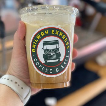 Railway Express Coffee and Eats - a hand holding a cup of coffee - Food Trucks Near Me - Santo, Texas Railway Express Coffee and Eats - a hand holding a cup of coffee - Food Trucks Near Me - Santo, Texas