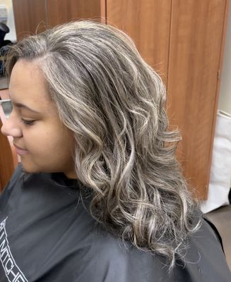 Blonde - Naturally dark hair, we performed a full foil “baby light” highlight