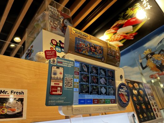 Kura Revolving Sushi Bar by null