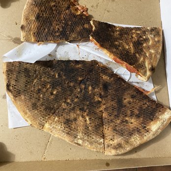 Mela Pizza House - Ordered this last night and that's how it came. Never again - Pizza Near Me - Astoria, New York