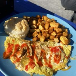 Granny's Country Kitchen - Southwestern omelet with home fries and a biscuit