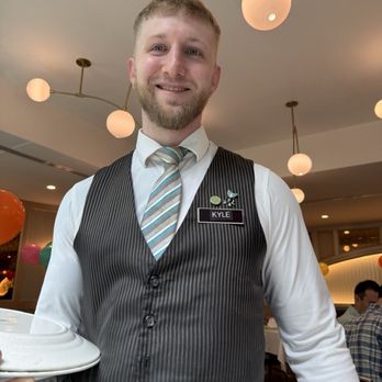 Commander's Palace - Fantastic server.  And how cool is that Blue Dog fleur-de-lis lapel pin!!! - Cajun/Creole Near Me - New Orleans, Louisiana