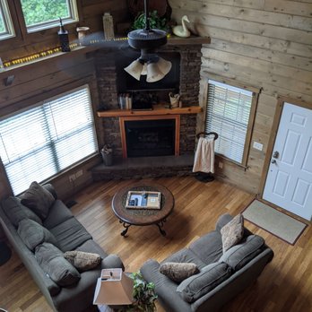 Bluff View Cabin - View of the living room from the upstairs - Vacation Rentals Near Me Bluff View Cabin - View of the living room from the upstairs - Vacation Rentals Near Me