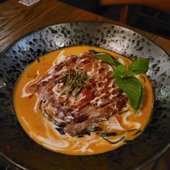 11 Tigers - My favorite dish. Squid ink pasta with a curry broth. Really hit the spot for me. - Asian Fusion Near Me - New York, New York 11 Tigers - My favorite dish. Squid ink pasta with a curry broth. Really hit the spot for me. - Asian Fusion Near Me - New York, New York