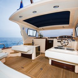Positano Charter - "Lady Gio" 40 ft Gozo (Made in Sorrento, Italy)   Back seating and table area with roof