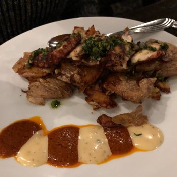 Mediterrano - Grilled octopus.  On Patatas not the yukon puree in the menu description.  Small portion of overcooked octopus. - Mediterranean Near Me - Ann Arbor, Michigan