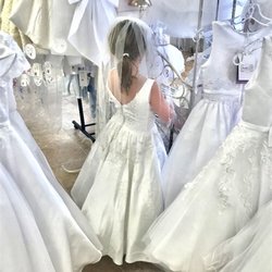 Once Upon A Time. A Special Occasions Boutique - Ringing the special "I said yes bell"