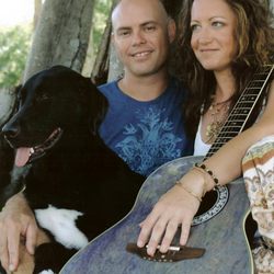 Tubby Time Mobile Grooming - Jeannie and Leo Burke with their doggie daughter  Melody