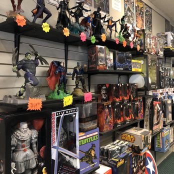 1. The Shop Tattoo & Comics