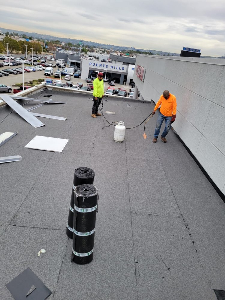 Slide of Home Town Roofing