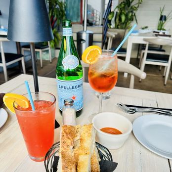 Piazza 1909 - Piazza Sunset, Aperol Spritz and homemade bread basket with tomato confit - Italian Near Me - San Diego, California
