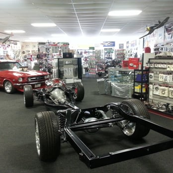 Street Rods Plus - Another view of the store interior with '65 Fastback Mustang + rolling chassis - Auto Parts & Supplies Near Me - Lodi, California Street Rods Plus - Another view of the store interior with '65 Fastback Mustang + rolling chassis - Auto Parts & Supplies Near Me - Lodi, California