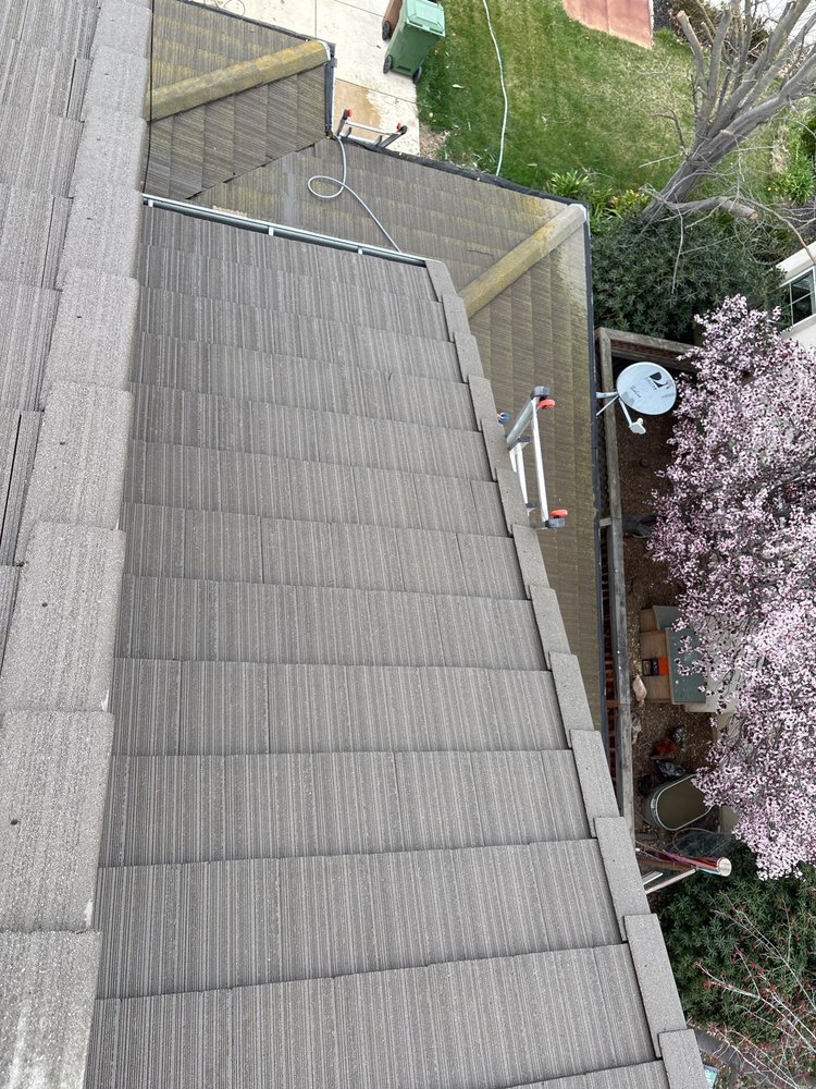Slide of Top Elevation Roof Cleaning And Repair