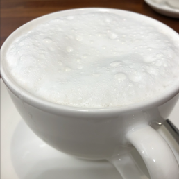 Those big bubbles represent a steaming wand that got the better of a barista, and produce a drink that is far less enjoyable to sip.