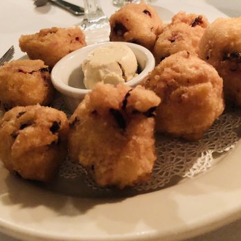 Ye Olde Tavern - Cranberry fritters, delicious paired with freshly churned maple butter - American Near Me - Manchester, Vermont Ye Olde Tavern - Cranberry fritters, delicious paired with freshly churned maple butter - American Near Me - Manchester, Vermont