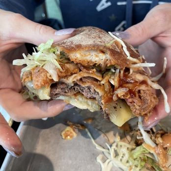 Stack 571 Burger and Whiskey Bar - You can see the burger patty the pulled pork and the crispy onions. Bomb - American Near Me - Vancouver, Washington Stack 571 Burger and Whiskey Bar - You can see the burger patty the pulled pork and the crispy onions. Bomb - American Near Me - Vancouver, Washington
