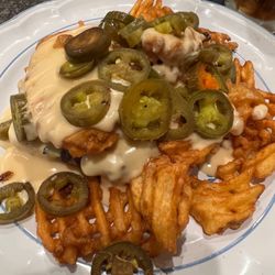 Whiskey Bill’s Saloon & Liquor Emporium - Ponyshoe with waffle fries and jalapeños