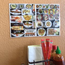 Vietnamese Restaurant & Sushi - Pictures on the wall and regular menu! Love how the have pictures up for us to see
