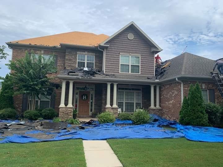 Slide of Tycon Roofing