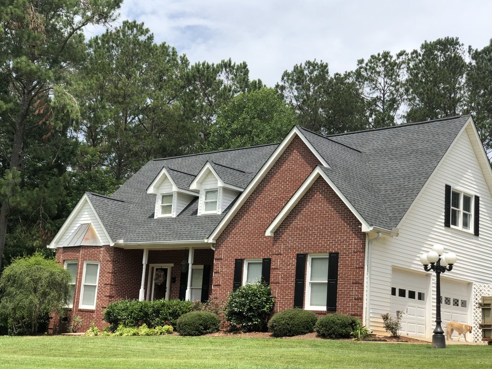 Slide of Tom Perkins Roofing Contractor