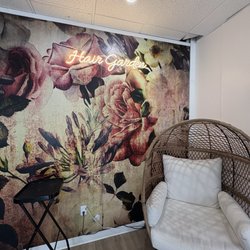 Mural wall with comfy chair.