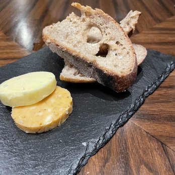 Gordon Ramsay Steak at Horseshoe Baltimore - Bread with butter and a honey/Old Bay spread - Steakhouses Near Me - Baltimore, Maryland Gordon Ramsay Steak at Horseshoe Baltimore - Bread with butter and a honey/Old Bay spread - Steakhouses Near Me - Baltimore, Maryland