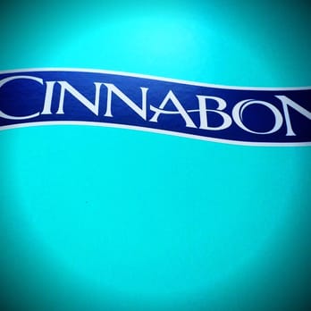 Cinnabon - a close up of a blue sign - Bakeries Near Me - Dade City, Florida Cinnabon - a close up of a blue sign - Bakeries Near Me - Dade City, Florida