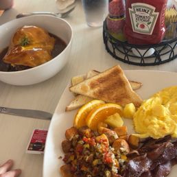 - Puakea Breakfast: with scrambled eggs, breakfast potatoes, bacon, and white toast - Loco moco - Puakea Breakfast: with scrambled eggs, breakfast potatoes, bacon, and white toast - Loco moco