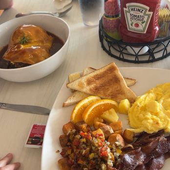 Puakea Grill - - Puakea Breakfast: with scrambled eggs, breakfast potatoes, bacon, and white toast - Loco moco - American Near Me - Lihue, Hawaii Puakea Grill - - Puakea Breakfast: with scrambled eggs, breakfast potatoes, bacon, and white toast - Loco moco - American Near Me - Lihue, Hawaii