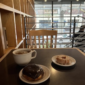 Top Pot Doughnuts - Bavarian Creme donut, Glazed old fashioned, and drip coffee - Bakeries Near Me - Seattle, Washington Top Pot Doughnuts - Bavarian Creme donut, Glazed old fashioned, and drip coffee - Bakeries Near Me - Seattle, Washington