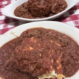 Half order lasagna and meatball. Half order lasagna and meatball.