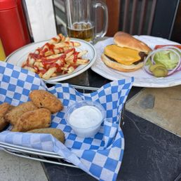 Cheeseburger, french fries (mountain), jalapeño poppers.