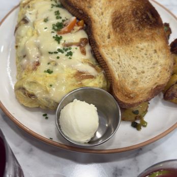 Board and Drink - Zucchini, grape tomatoes, caramelized onions, and gruyere cheese - Breakfast & Brunch Near Me - San Francisco, California