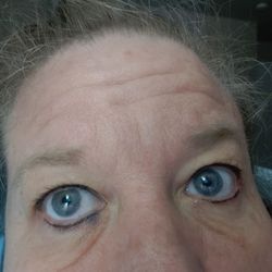 Bohemian Beauty - Uneven crooked eyeliner with pigment migration.