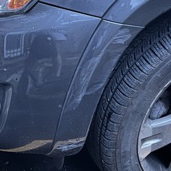 Brookline Foreign Motors - After the accident, before repairs. Another car scraped the front left up in an aggressive merging maneuver.