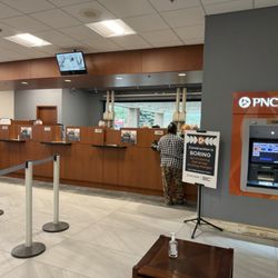 PNC Bank - Teller stations, and drive thru window is visible in background.
