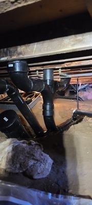 New sewer repipe or construction in crawl space . - this work was done in a house were pipes where liking.