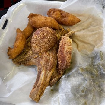 Charlie's Grill - Fried pork chop, navy beans, green beans, and hushpuppies - Breakfast & Brunch Near Me - Battleboro, North Carolina Charlie's Grill - Fried pork chop, navy beans, green beans, and hushpuppies - Breakfast & Brunch Near Me - Battleboro, North Carolina