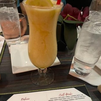 Sisserou's Caribbean Restaurant & Catering - Mango Daiquiri - Caribbean Near Me - Tulsa, Oklahoma Sisserou's Caribbean Restaurant & Catering - Mango Daiquiri - Caribbean Near Me - Tulsa, Oklahoma