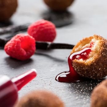 Topgolf - a chocolate covered donut with raspberries and chocolate - Golf Near Me - Vineyard, Utah