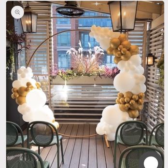 Monarch Balloons - Gold/white arch with the balloons split. - Balloon Services Near Me Monarch Balloons - Gold/white arch with the balloons split. - Balloon Services Near Me