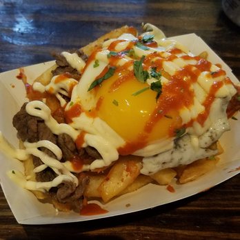 Hop Scholar Ale House - Bulgogi fries. The bulgogi beef is DELICIOUS! Perfectly cooked runny fried egg. Yummy kim chi. This is a must try. - Beer Bar Near Me - Spring, Texas