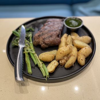 Corazon - Skirt steak with chimichurri, fingerling potatoes, & broccoli rabe - Wine Bars Near Me - Tampa, Florida Corazon - Skirt steak with chimichurri, fingerling potatoes, & broccoli rabe - Wine Bars Near Me - Tampa, Florida