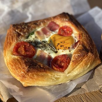 Crust Bakery - Farmer Ben's Egg Pastry with bacon, tomato, and rosemary - Bakeries Near Me - Victoria, British Columbia Crust Bakery - Farmer Ben's Egg Pastry with bacon, tomato, and rosemary - Bakeries Near Me - Victoria, British Columbia