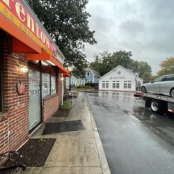 Pro Tech Towing and Recovery, Inc - Driver takes me in the wrong direction, goes and orders dinner, blocks all the cars in the parking lot, then charges me for extra mileage.