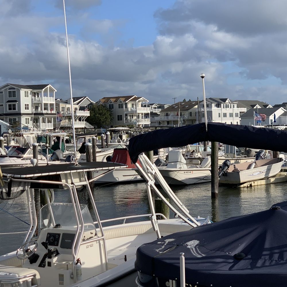 Sunset Pier Restaurant - a view of boats docked in a marina - Sandwiches Near Me - Sea Isle City, New Jersey Sunset Pier Restaurant - a view of boats docked in a marina - Sandwiches Near Me - Sea Isle City, New Jersey