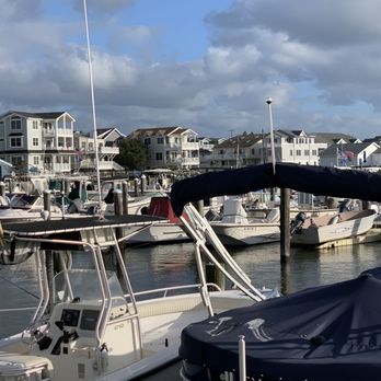 Sunset Pier Restaurant - a view of boats docked in a marina - Sandwiches Near Me - Sea Isle City, New Jersey Sunset Pier Restaurant - a view of boats docked in a marina - Sandwiches Near Me - Sea Isle City, New Jersey