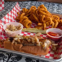 Brat with grilled onions and sauerkraut
