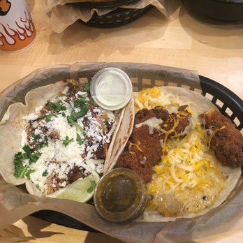 Torchy's Tacos - Green Chile Pork (left) and Trailer Park (right) Tacos - Tacos Near Me - Austin, Texas Torchy's Tacos - Green Chile Pork (left) and Trailer Park (right) Tacos - Tacos Near Me - Austin, Texas